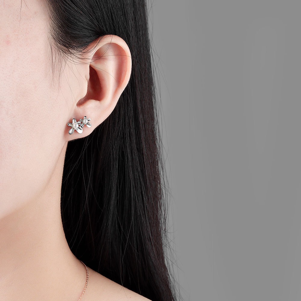 S925 sterling silver stud earrings with irregular florets - Image 5